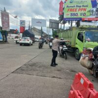 Polsek Cikupa Laksanakan Giat Pengaturan Lalu Lintas di Simpang Cikupa Mas