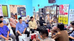 Bhabinkamtibmas Desa Sukanagara Hadiri Rapat Anggota Tahunan Koperasi Merah Putih