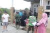 Kebersamaan Personel Satgas TMMD Ke-128 Kodim 0908/Bontang dan Warga Terjalin Hangat di Tengah Pengecoran Jalan