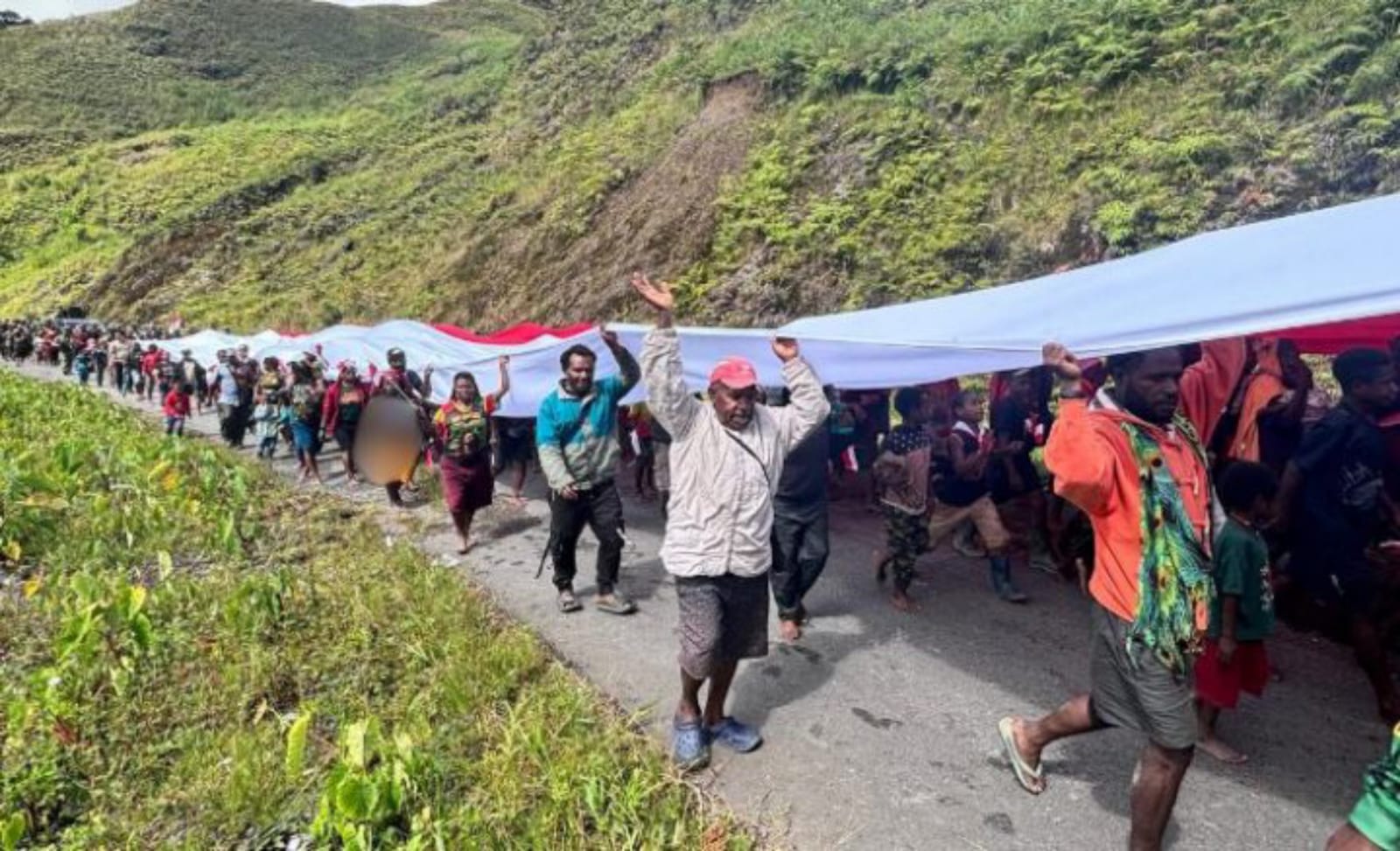 IMG-20260601-WA0074 Peringatan Hari Lahir Pancasila, 800 Warga Puncak Jaya Kirab Bendera 50 Meter