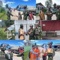 Mengukir Senyum di Tanah Papua, Satgas Marinir Gobang 8 Berbagi Cokelat untuk Anak-Anak Waghete