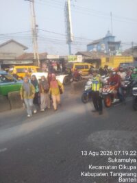 Personel Lantas Polsek Cikupa Laksanakan PECAK, Atur Arus Lalu Lintas Pagi Hari